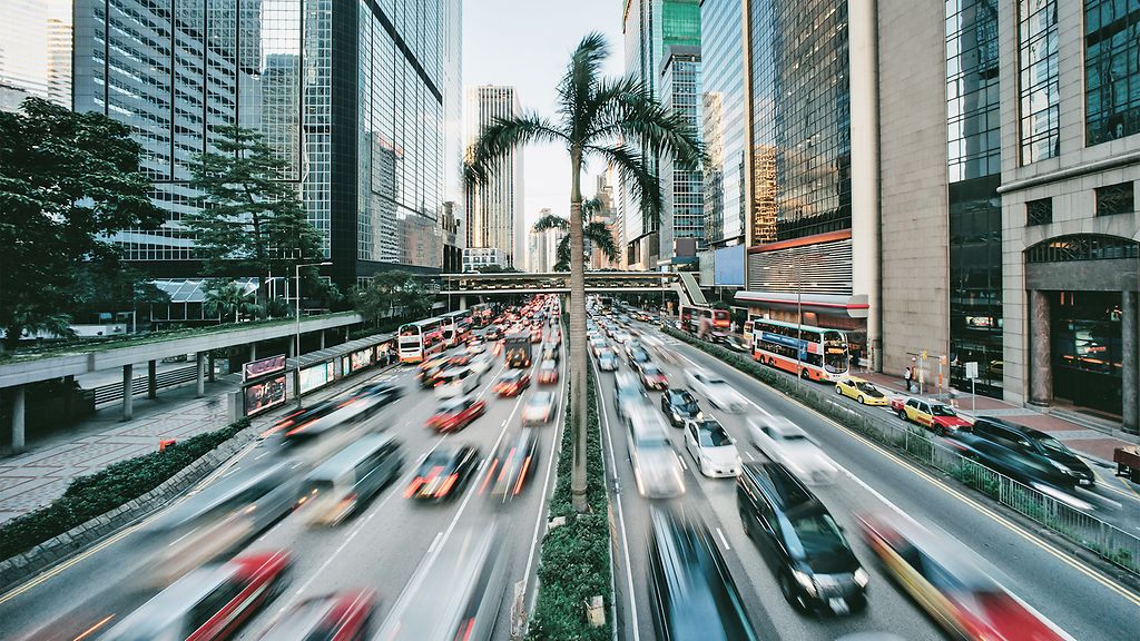 The prosperity of Hong Kong cityscape with modern skyscrapers and motion traffic at rush hour ©GettyImages/Yiu Yu Hoi